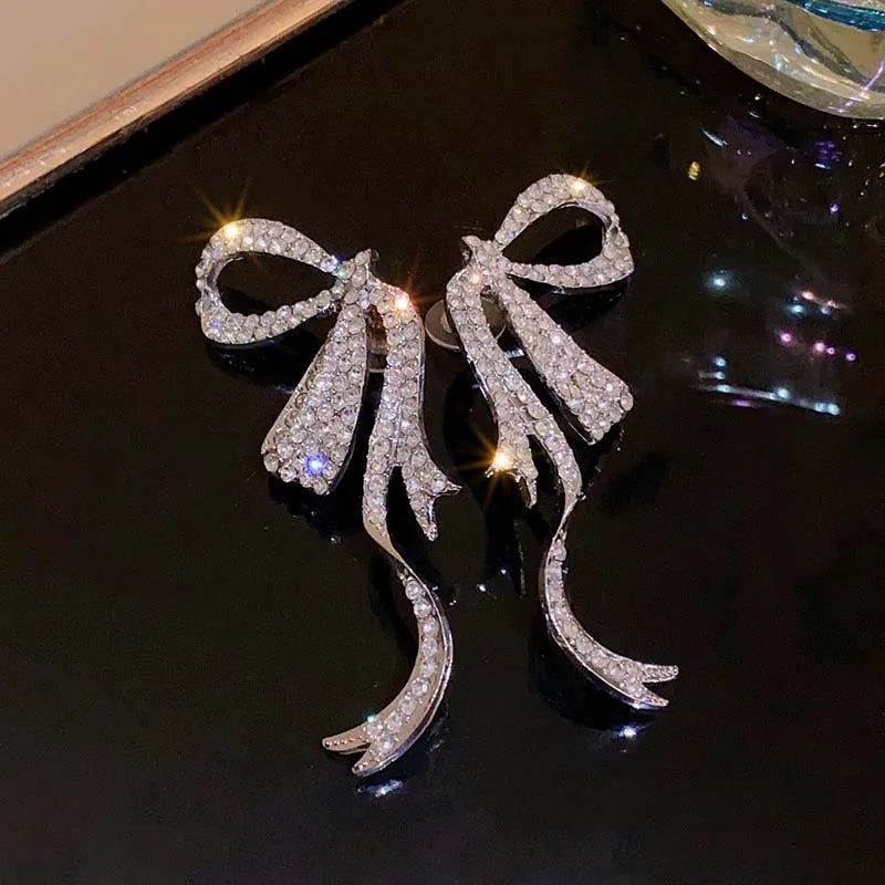 SM-2014 【即納】ラインストーンハーフリボンピアス