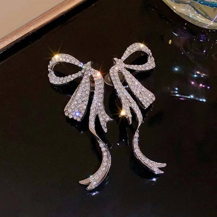 SM-2014 【即納】ラインストーンハーフリボンピアス